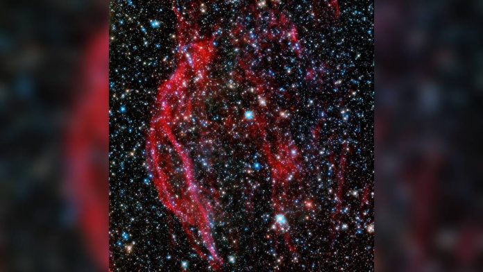 Death of a White Dwarf Star Creates Cosmic Red Ribbons of Gas, NASA Shares Photo